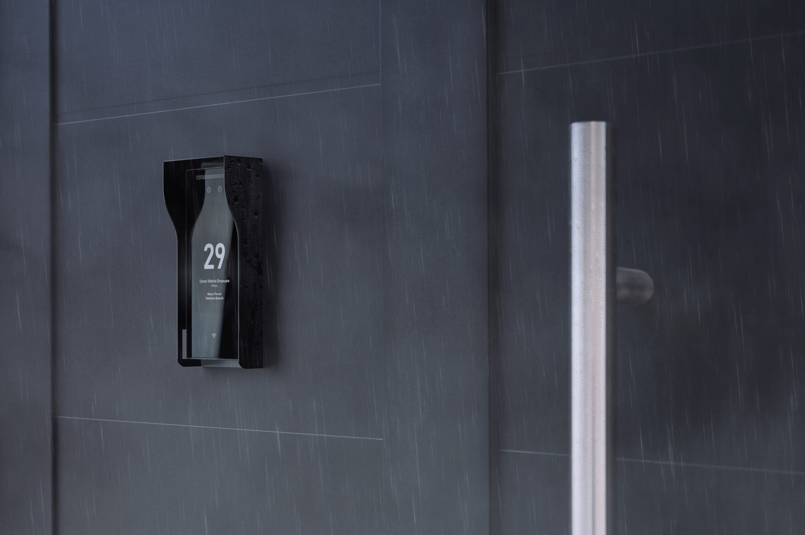 detail of an entrance door to a house with a doorbell with camera